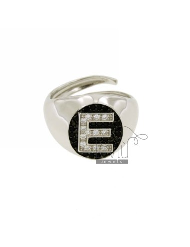 Letter and ring with white...