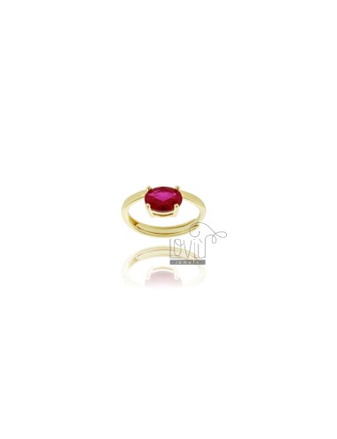 Ring with red oval zircon...