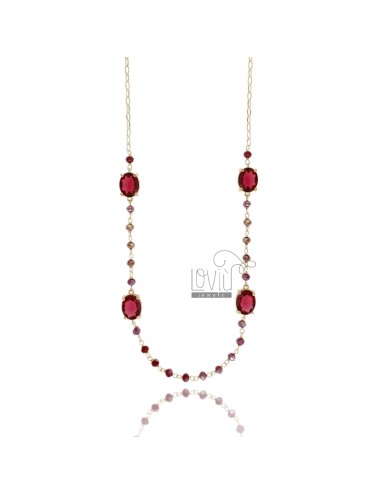 Necklace with red stones in...